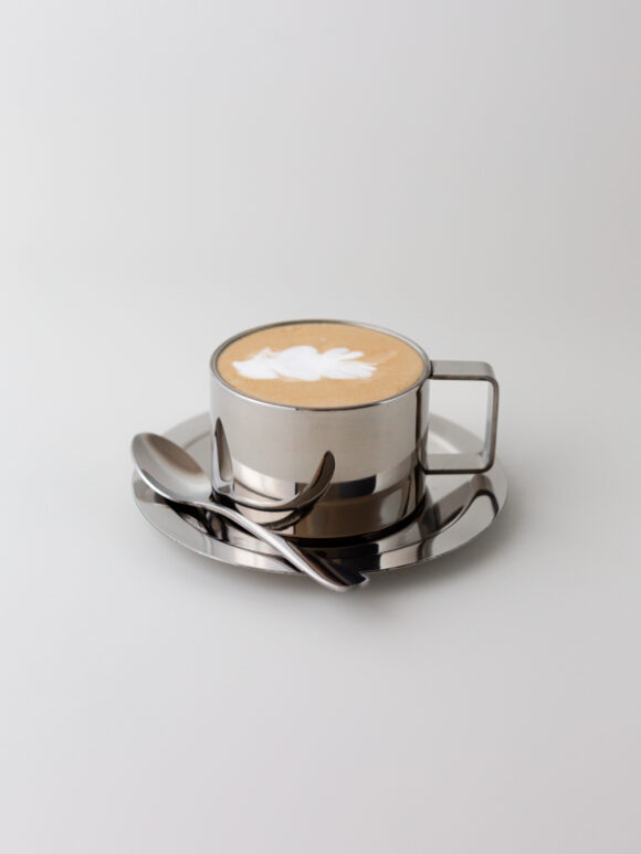 Chrome steel cup and saucer